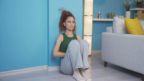Depressed-woman.-It-sits-by-the-wall.